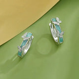 Mint Green Butterfly Ear Buckles
