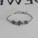 Gothic Rose Bracelet with Red Zircon and Silver