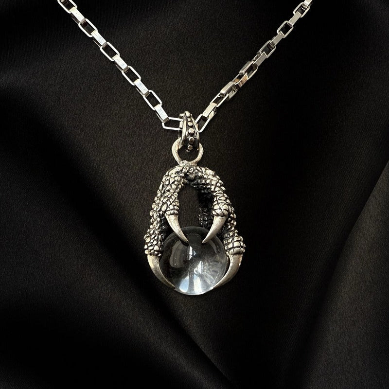 The Eagle‘s Claw Grabs the Crystal Ball Pendant Necklace