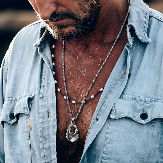 The Eagle‘s Claw Grabs the Crystal Ball Pendant Necklace